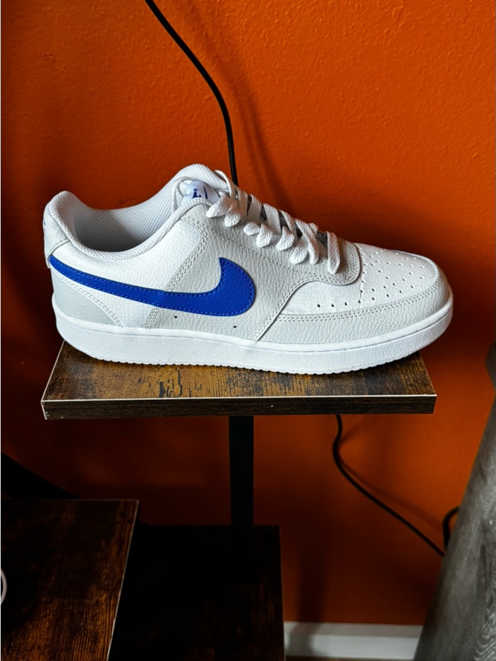 Nike White Sneakers with Blue Swoosh